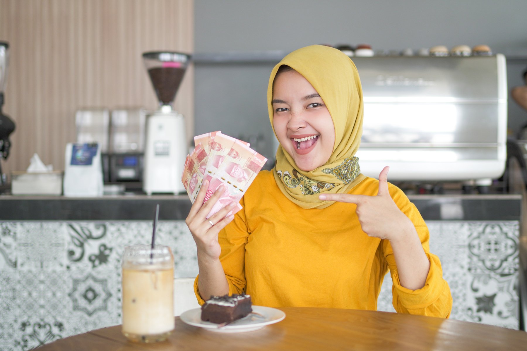 Asian Hijab Woman Pointing Rupiah Money